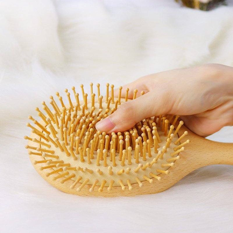頭皮按摩護發木(mù)質氣囊梳